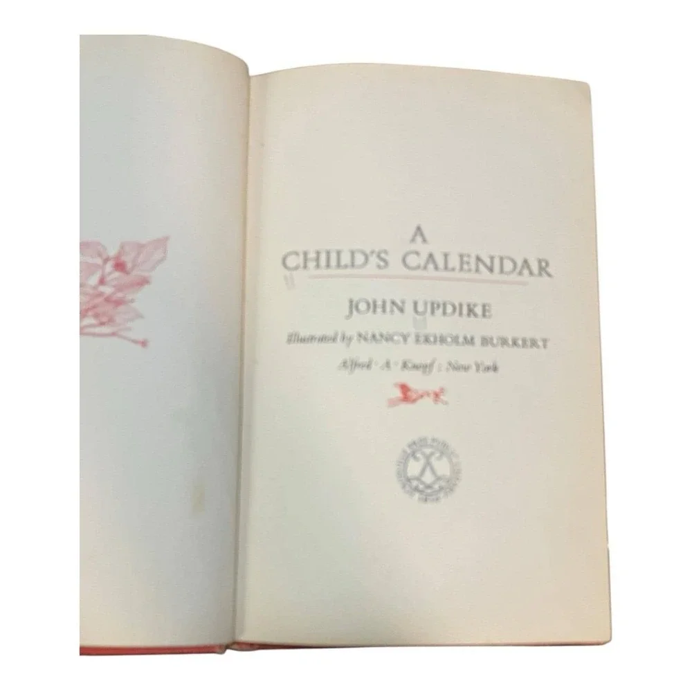 A CHILD'S CALENDAR‎ By John Updike & Nancy Ekholm Burkert - Hardcover Ex Library